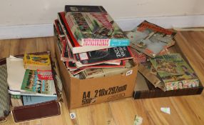 A suitcase of mixed ephemera, magazines, railway puzzles, a 'Thunderbirds Are Go' magazine and