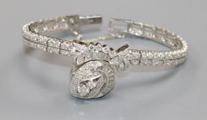 A lady's 14k white gold and diamond encrusted Hamilton manual wind cocktail watch, the dial with