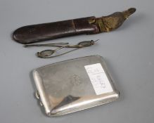 A George V silver cigarette case and a pair of WWI spectacles.