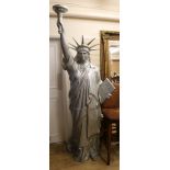 A large cast metal figure, Statue of Liberty