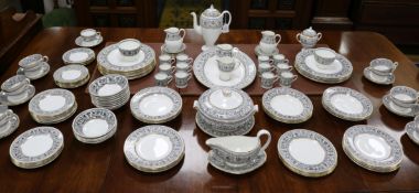 A Wedgwood black and gold Florentine dinner service