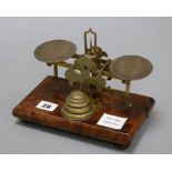 A set of Victorian brass and walnut postal scales and weights length 20.5cmex Congelow House