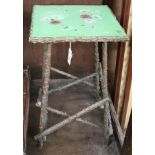 A rustic pattern table, the rectangular top painted with flowers on a blue ground, W.1ft 5in.ex