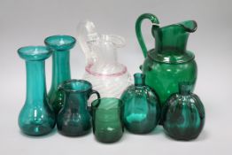 A Murano style hand-blown pink-banded plain wrythen glass jug and seven pieces of green glassware,