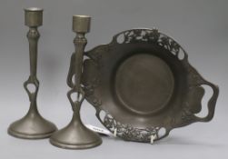An Art Nouveau Liberty Tudric pewter dish and a pair of pewter candlesticksex Congelow House