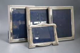 A pair of modern silver mounted photograph frames, Sheffield, 1991 and two other silver frames,