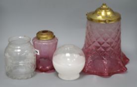 A large Victorian quilted cranberry glass light shade and three othersex Congelow House