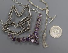 A white metal and amethyst necklace, a white metal fob, a Vancouver dollar and an Edwardian style