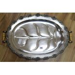 A silver plated two handled meat platter length 68cm