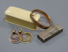 A seed pearl set 15ct gold tiepin, a silver Dunhill cigarette lighter, a 9ct gold bangle and a