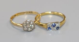 An early 20th century 18ct gold and diamond cluster ring and an 18ct gold, sapphire and diamond