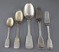 A mixed part canteen of George VI, Victorian and later mainly fiddle pattern silver cutlery, 84 oz.