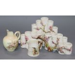 A Royal Worcester 'cluster' of vases, applied with blossoming hawthorn, 24cms, and two Royal