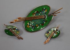 A "Matisse" base metal and coloured enamel palette and brush brooch and a pair of earrings.