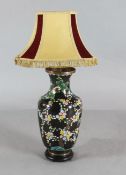 A Japanese cloisonne black ground vase, decorated with colourful prunus blossom, fitted as a table