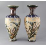 A pair of Royal Doulton stoneware baluster vases, decorated by Eliza Simmance, with stylised foliate