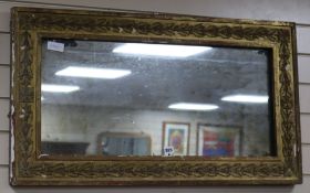 A 19th century rectangular giltwood and gesso mirror with oak leaf banding 53 x 94cm