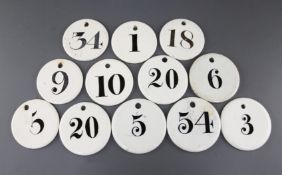 Twelve circular bin number labels, six Charles Farrow, six Farrow & Jackson