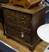 A small George III mahogany chest, with brushing slide and four long drawers 76cm