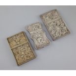 Three 19th century silver filigree work card cases largest 10 x 6.5cm
