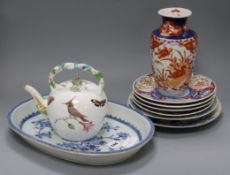 A Chinese export blue and white dish, four Imari plates and an 18th century English tea pot