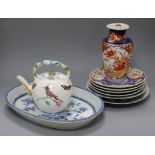 A Chinese export blue and white dish, four Imari plates and an 18th century English tea pot