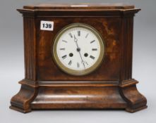 A late Victorian walnut cased eight day mantel clock height 25cmex Congelow House