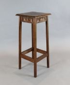 Attributed to Alfred Waterhouse. An oak jardiniere table, with moulded rectangular top and carved