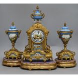 A French porcelain and ormolu clock garniture on stand overall height 39cm