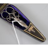 A Victorian cased set of two pairs of scissors