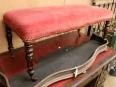 A William IV rectangular stool, upholstered in old rose velvet, on simulated rosewood turned lotus
