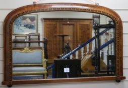 A Victorian walnut and parquetry arched overmantel mirror, W.102cm
