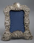 An Edwardian repousse silver mounted photograph frame, Chester, 1903, 22.5cm.