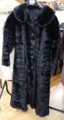 A dark brown mink coat