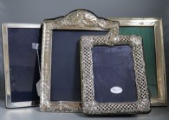 Four assorted large modern silver mounted photograph frames including Harrod's Ltd, largest 36cm.