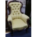 A Victorian mahogany button back armchair with brass presentation plaque relating to Reverend