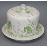 A Victorian Staffordshire pottery circular cheese dish and cover, decorated with fernsex Congelow