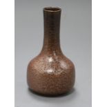 A high-fired stoneware metallic glaze bottle vase, unmarked, ex Geoffrey Godden collection height