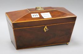 A Victorian inlaid mahogany sarcophagus shaped tea caddy length 28cm, missing one footex Congelow