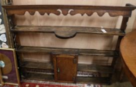 A George III oak four tier plate rack W.123cm