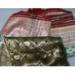 Three 20th century thread and silk woven saris
