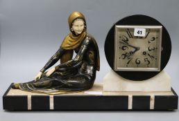 An Art Deco figural clock length 49.5cm