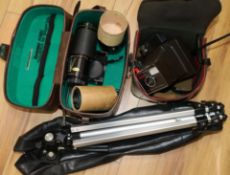 A collection of vintage cameras and equipment