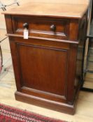 A Victorian mahogany pedestal cupboard, with lifting top and dummy frieze drawer, with panelled door