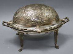 An Edwardian plated engraved breakfast tureen with swivel dome cover and a Victorian plated