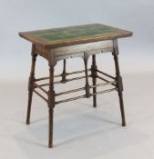 An Arts & Crafts oak rectangular centre table, probably Liberty & Co. the top inset with green