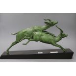 An Art Deco model of antelope, signed Plagnet length 51cm