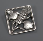 A Danish Georg Jensen sterling silver "robins and wheat" brooch, no. 250, 36mm.