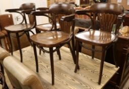 A set of four bentwood elbow chairs