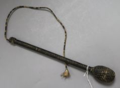 An early 19th century naval cosh or 'Bosun's Persuader', bound in tarred string, length 28.5cm